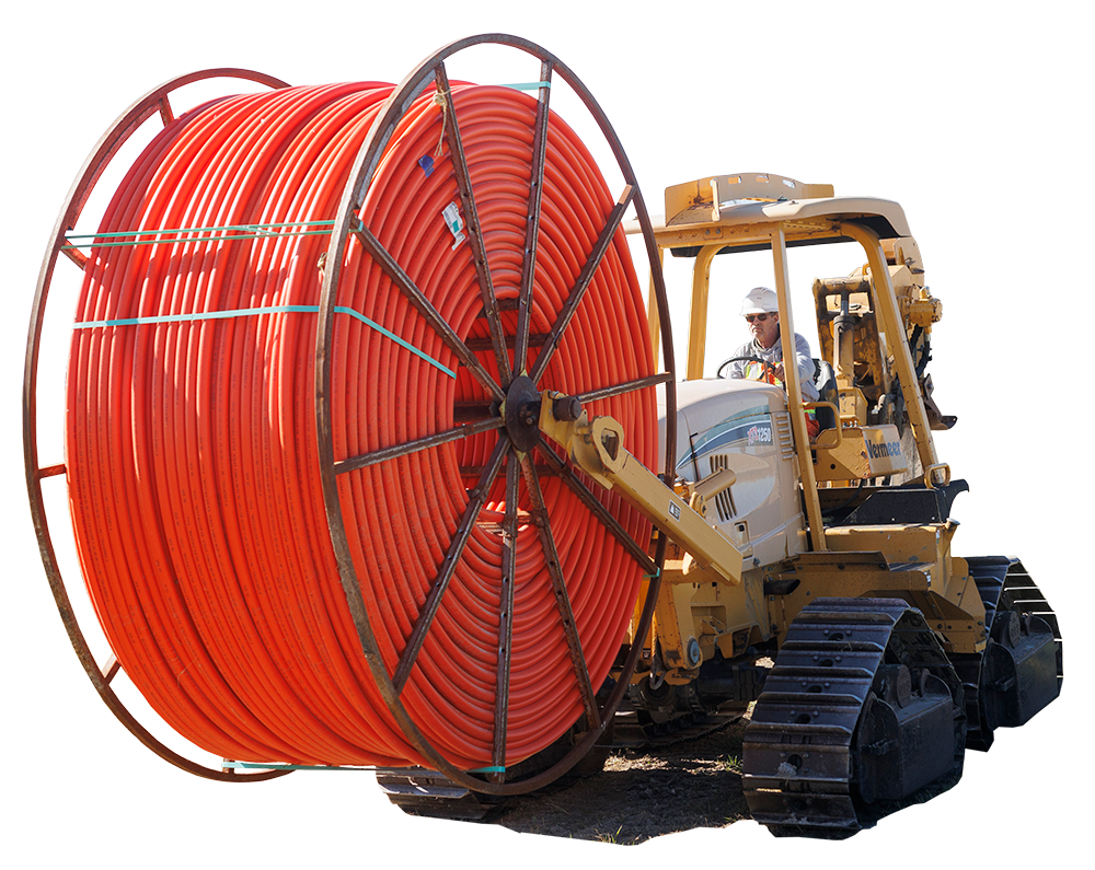 construction equipment with orange conduit reel